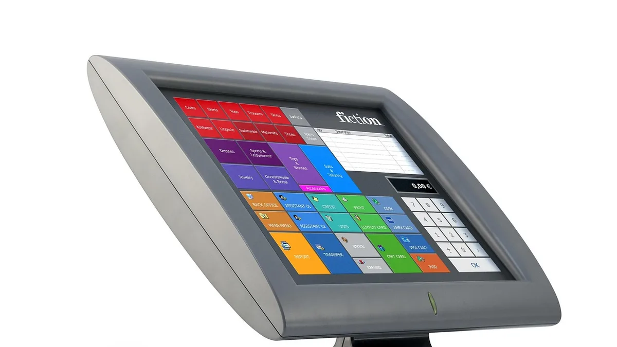 Touchscreen point-of-sale terminal on a restaurant counter